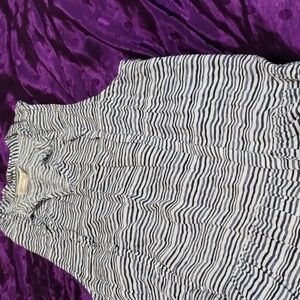 Striped blue and white sleeveless shirt